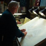 Blind volunteer reads Mary Rose painting. Blind volunteer reads Mary Rose painting.